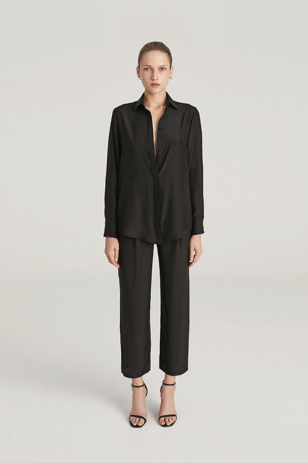 Black silk satin shirt and black suit trousers