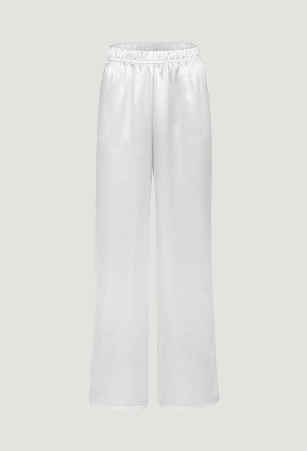 Silk white pants with high waist and wide legs Jedwabne białe spodnie z wysokim stanem i szerokimi nogawkami
