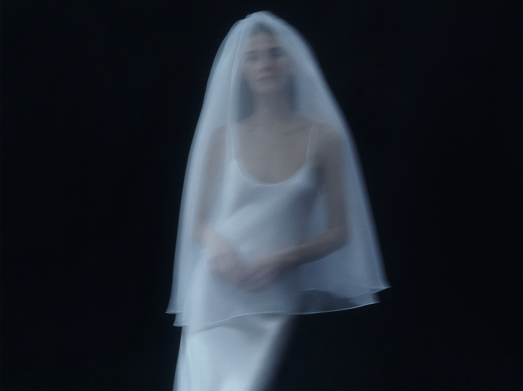 White silk dress and wedding veil