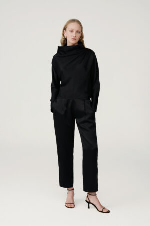 Silk satin blouse with draping and black suit trousers
