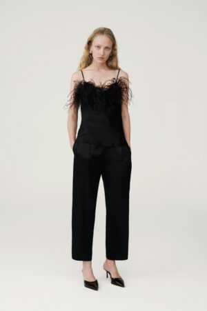 Black silk satin top with feathers and suit pants
